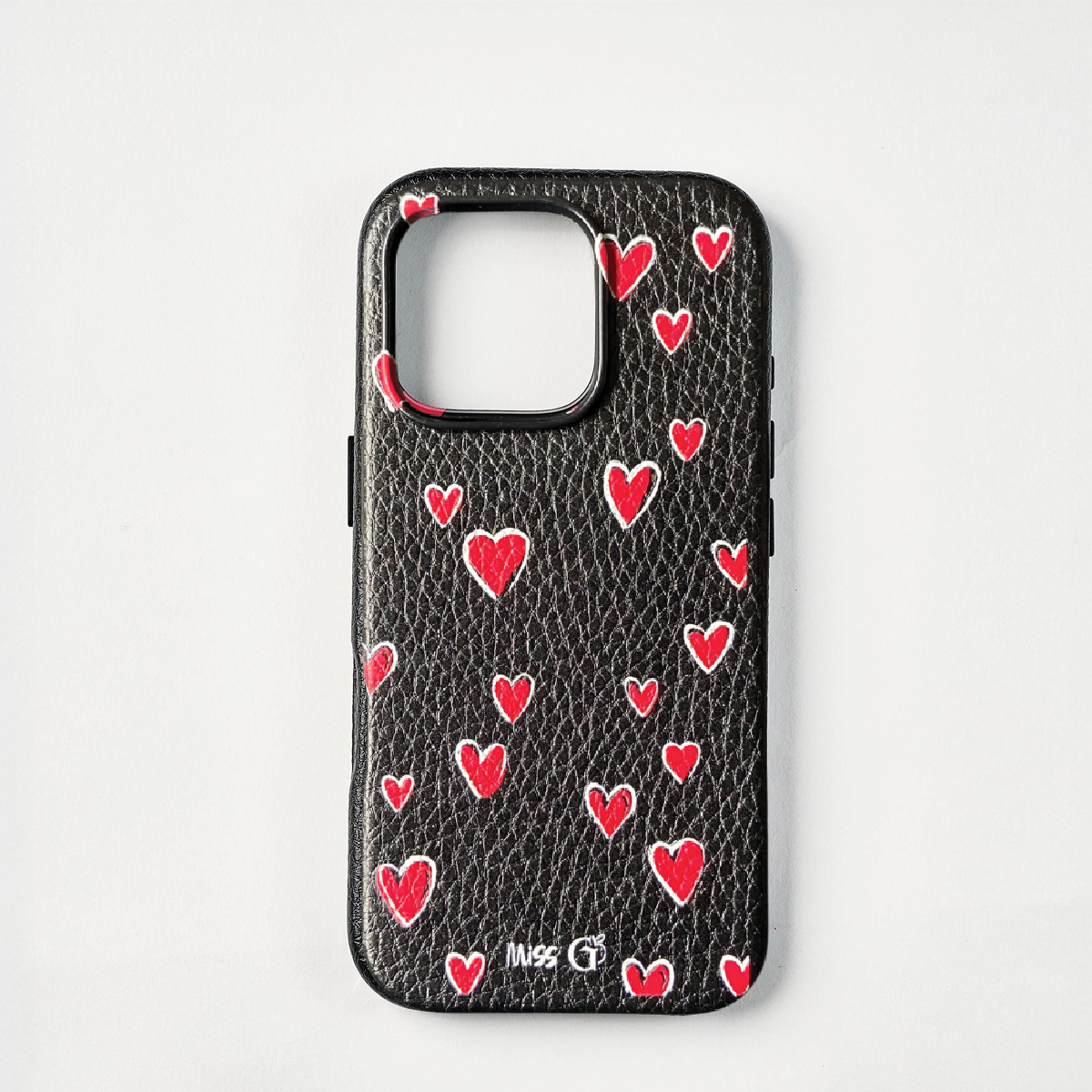Leather case with red and white hearts pattern